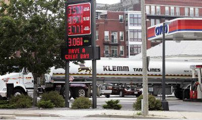 
A tanker fills the tanks at a gas station Wednesday in Milwaukee. The potential damage to oil platforms, refineries and pipelines that remain closed along the Gulf Coast drove energy prices to new highs. 
 (Associated Press / The Spokesman-Review)