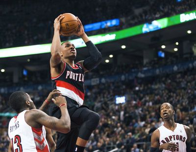 Trail Blazers’ Damian Lillard scored 25 points and was 3 for 3 in overtime in a 118-110 victory over host Toronto on Sunday. (Associated Press)