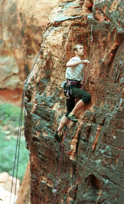 
An unidentified climber scales a Red Rock cliff at Red Rock Canyon near Las Vegas. The made-for-TV competition 