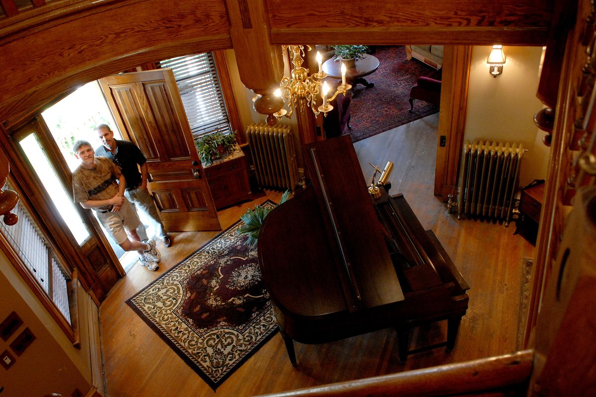 Steven Sanford and Mike Schultz restored the old Muzzy Mansion, July 15, 2008, on the north side of Spokane, WA.   (Brian Plonka / The Spokesman-Review)