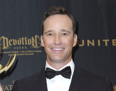 FILE - Producer Mike Richards poses in the pressroom at the 43rd annual Daytime Emmy Awards on May 1, 2016, in Los Angeles. Richards is out as executive producer of “Jeopardy!”, days after he exited as the quiz show’s newly appointed host because of past misogynistic and other comments. Richards is also no longer executive producer of “Wheel of Fortune.