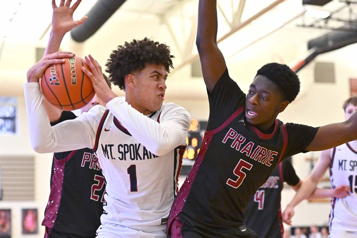 Mt. Spokane Wildcats forward Jaden Ghoreishi (1) shoots against Prairie Falcons guard Benjamin Nkansah (5) in the second half of a State 3A regional round game on Saturday, Feb. 28, 2026, at West Valley High School in Spokane, WA. (James Snook)