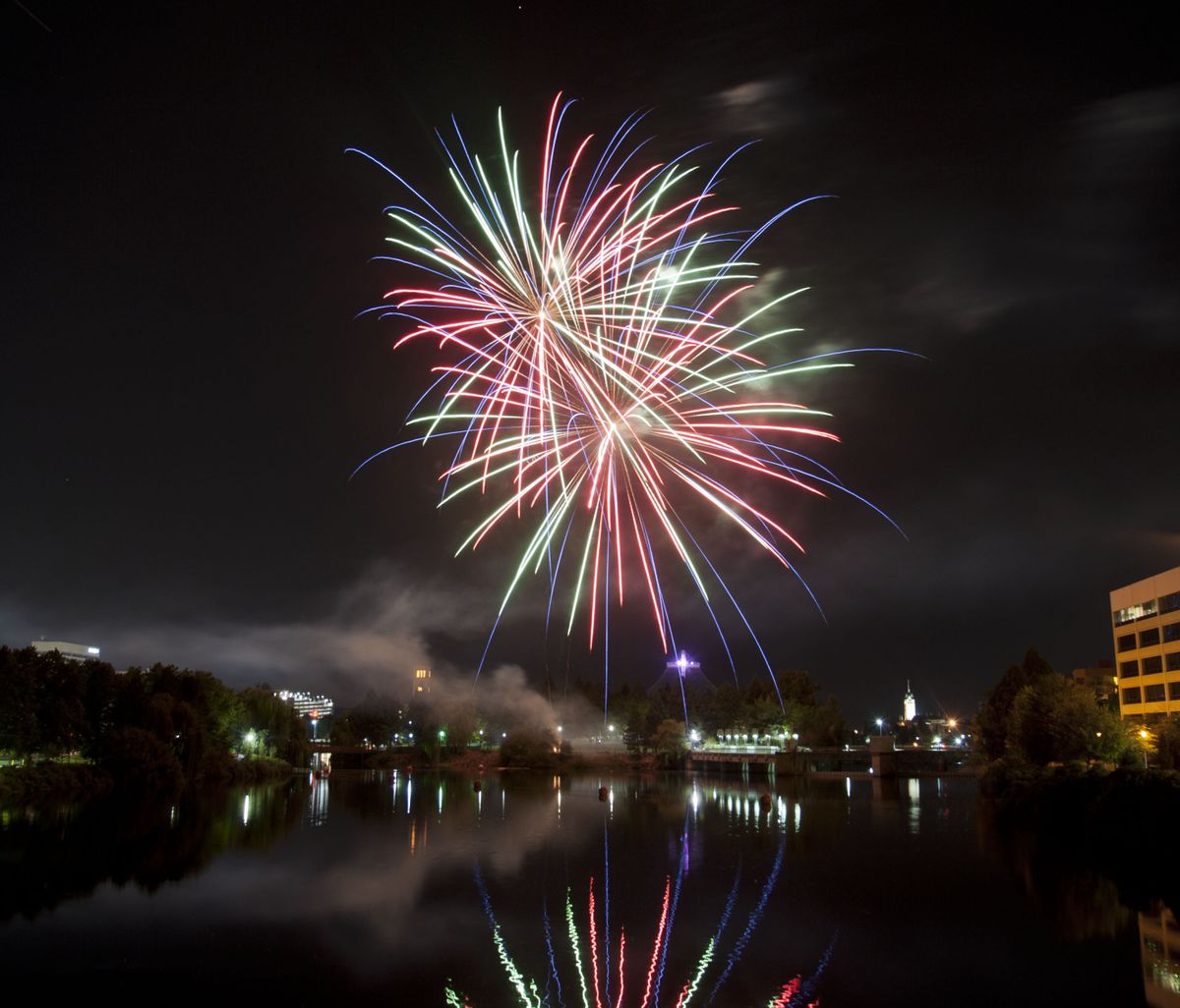 Fireworks light up the night sky at the conclusion of the 35th Allegro Baroque and Beyond Royal Fireworks Concert on Sunday in Spokane’s Riverfront Park. The performance was the last one by the longtime presenter. (Dan Pelle)