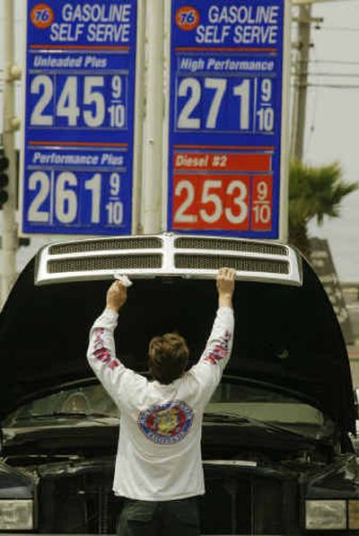 
The price of crude oil, which peaked at around $42 a barrel in late May, is expected to ease to around $35 a barrel later this year, resulting in an easing in retail gasoline prices. 
 (File/Associated Press / The Spokesman-Review)