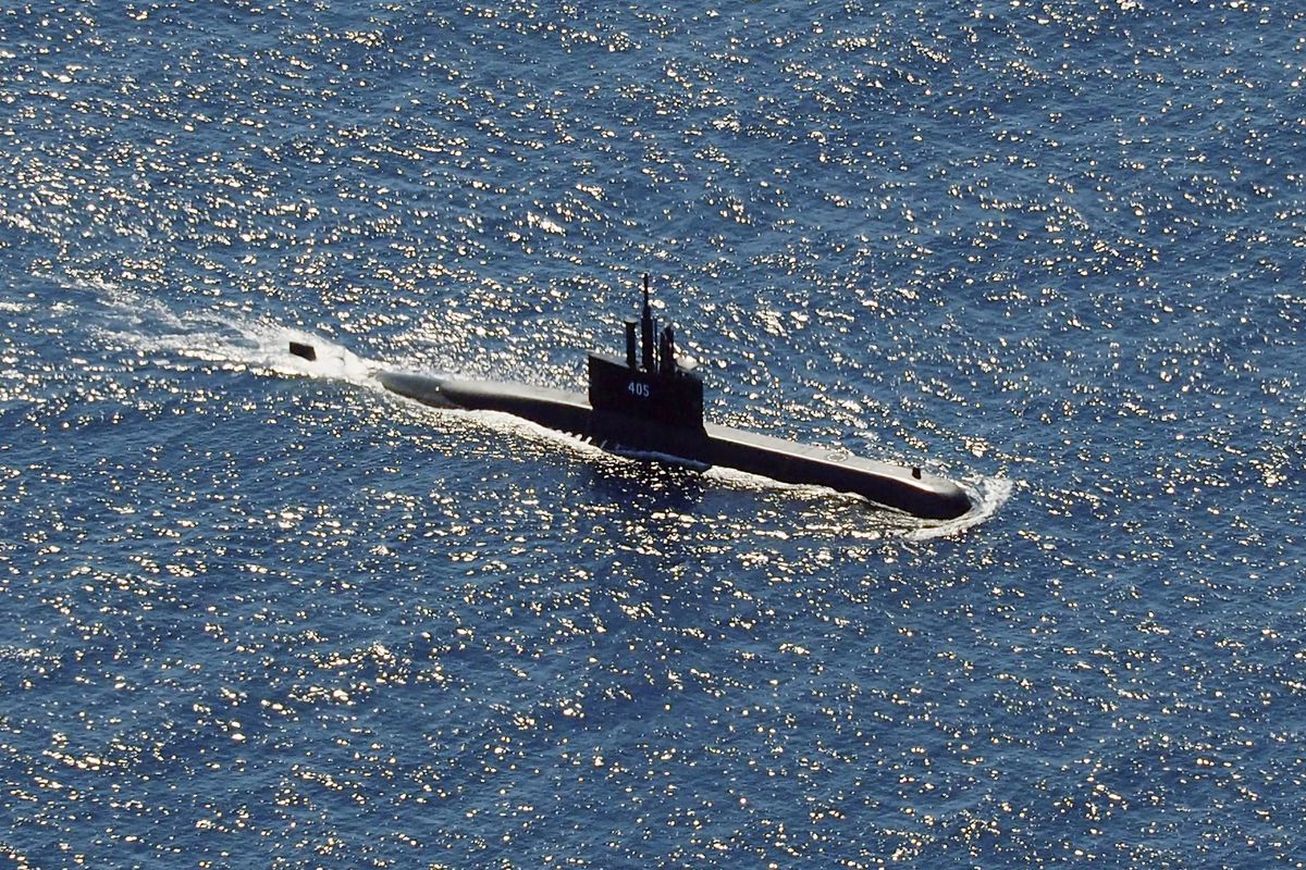 In this aerial photo taken from a maritime patrol aircraft of 800 Air Squadron of the 2nd Air Wing of Naval Aviation Center (PUSPENERBAL), the Indonesian Navy submarine KRI Alugoro sails during a search for KRI Nanggala, another submarine that went missing while participating in a training exercise on Wednesday, in the waters off Bali Island, Indonesia, Thursday, April 22, 2021. Indonesia