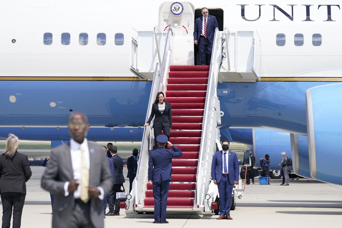 Vice President Kamala Harris is greeted by United States Air Force Lt. Col. Neil Senkowski as she deplanes Air Force Two after a technical issue forced the aircraft to return and land at Andrews Air Force Base, Md., Sunday, June 6, 2021, as she was en route to Guatemala City. (Jacquelyn Martin)