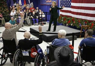 
Democratic presidential hopeful Sen. Hillary Rodham Clinton, D-N.Y., speaks at a Holidays with Hillary campaign stop at the Iowa Veterans Home on Sunday in Marshalltown, Iowa. Associated Press
 (Associated Press / The Spokesman-Review)