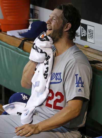 Dodgers’ pitcher Clayton Kershaw may require surgery to repair a herniated disk in his back. (Gene J. Puskar / Associated Press)