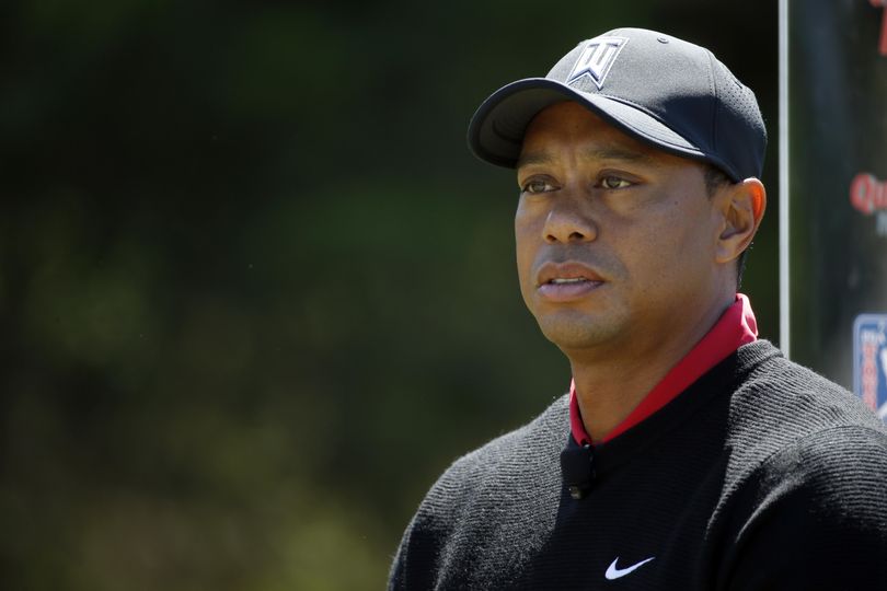Tiger Woods will miss this year’s PGA Championship, meaning he’ll go the entire season without playing in a major. (Alex Brandon / Associated Press)