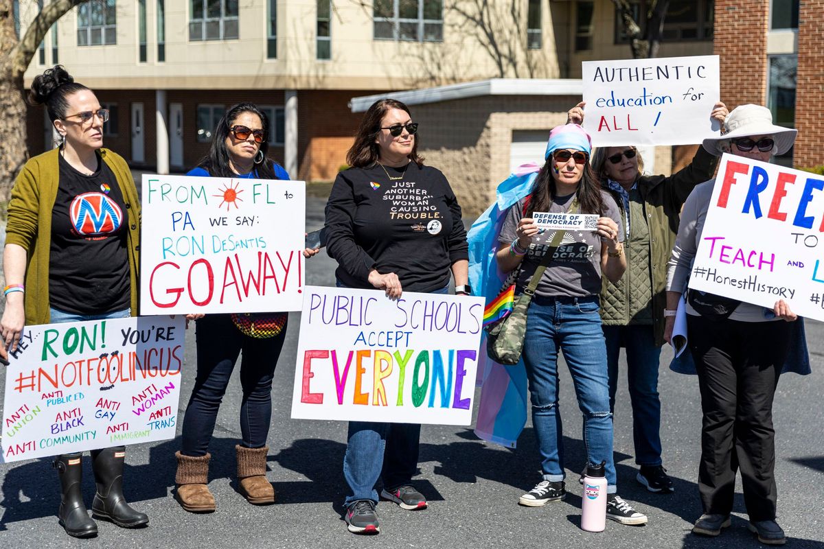 Protesters demonstrate outside the Penn Harris Hotel, where Florida Gov. Ron DeSantis spoke at the Pennsylvania Leadership Conference on Saturday, April 1, 2023, in Harrisburg, Pennsylvania. (Tyger Williams/The Philadelphia Inquirer/TNS)  (Tyger Williams/The Philadelphia Inquirer/TNS)