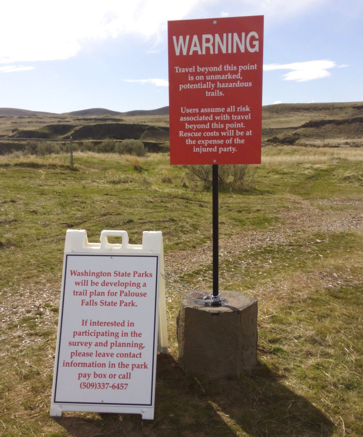 Signs are posted at Palouse Falls State Park warning visitors that hiking near the cliffs is dangerous and that they do so at their own risk. (Rich Landers)