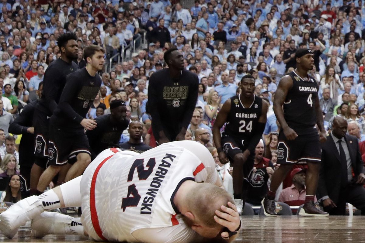 Gonzaga center Przemek Karnowski rests on the court after getting injured during the first half against South Carolina in the semifinals of the Final Four NCAA college basketball tournament, Saturday, April 1, 2017, in Glendale, Ariz. (David J. Phillip / Associated Press)
