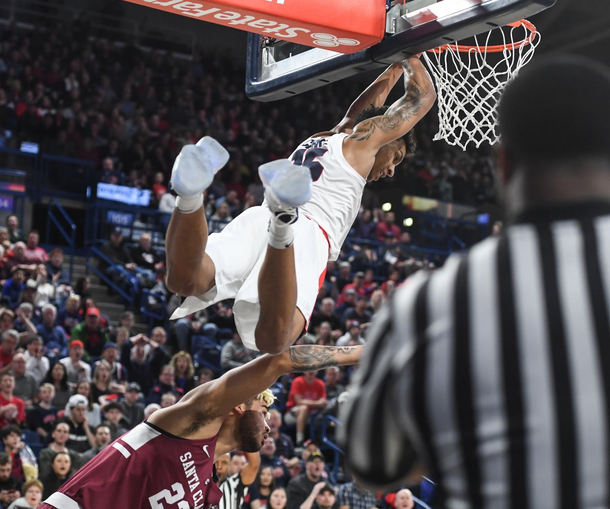 Gonzaga forward Brandon Clarke goes for a flying dunk over Santa Clara center Zeke Richards, Saturday, Jan. 5. 2019, in the McCarthey Athletic Center. (Dan Pelle / The Spokesman-Review)