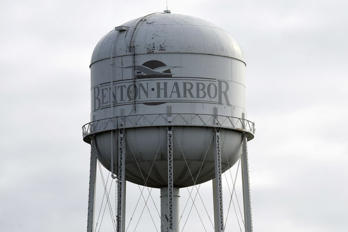 In this Wednesday, Oct 24, 2018 photo, a water tower is pictured near downtown Benton Harbor, Mich. Advocacy groups are urging the Biden administration to help provide safe drinking water in Benton Harbor, a low-income, majority-Black city in southwestern Michigan where tests repeatedly have shown excessive lead levels.  (Don Campbell)