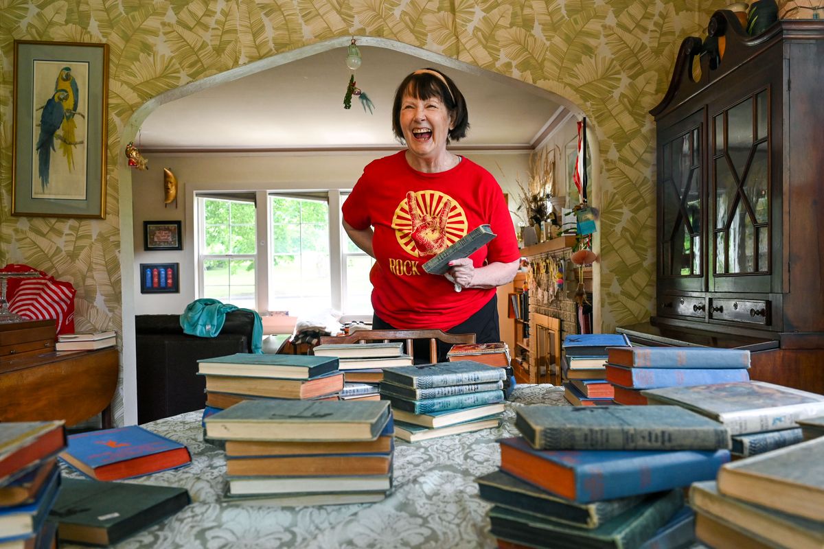 Susan Bunting, of Spokane, has a big laugh as she talks about her collection of Nancy Drew books. All are first editions. Most came from Powell’s Book Store in Portland. “It is lucky I got them when I did, because now they are impossible to find. They are all from the early ’30s.”  (DAN PELLE/THE SPOKESMAN-REVIEW)