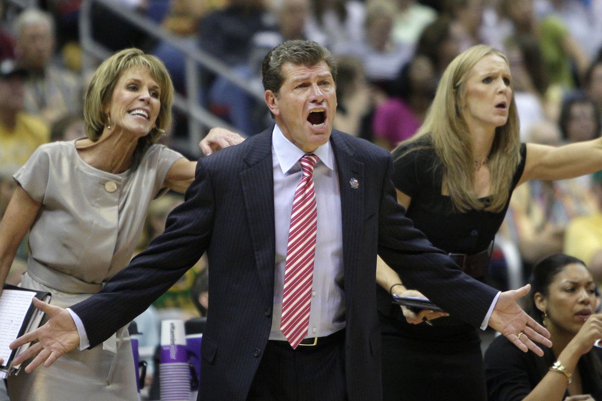 UConn coach Geno Auriemma, center, and assistants Chris Dailey, left, and Shea Ralph express themselves during the first half of the Huskies’ win over Baylor. (Associated Press)