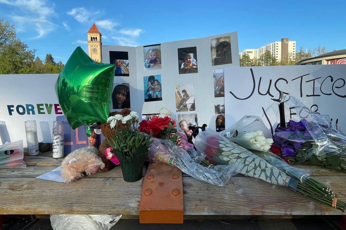 A memorial was set up for 12-year-old Nahziyien Gordon on Saturday at a Riverfront Park bridge where he jumped from Wednesday night in downtown Spokane.  (Garrett Cabeza / The Spokesman-Review)