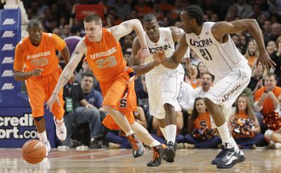 Syracuse’s Eric Devendorf is off and running after a first-half steal.   (Associated Press / The Spokesman-Review)