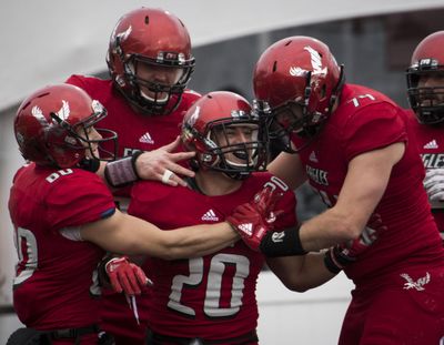 Eastern Washington running back Sam McPherson (20) celebrates scoring a touchdown during  a game Oct. 14, 2017, in Cheney. (Colin Mulvany / The Spokesman-Review)