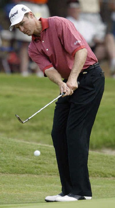 
Bob Estes, chipping during the second round of last month's U.S. Open, flew to Scotland for the outside chance of getting into the British Open as an alternate. 
 (Associated Press / The Spokesman-Review)