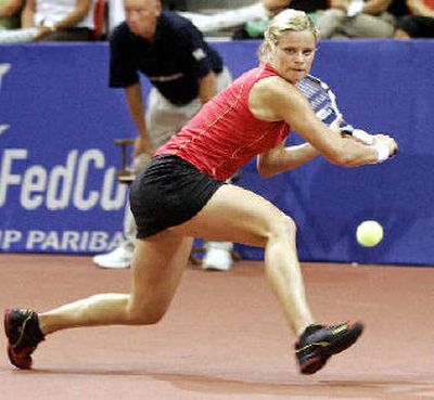 
Belgium's Kim Clijsters returns the ball toward Jamea Jackson in Fed Cup.
 (Associated Press / The Spokesman-Review)