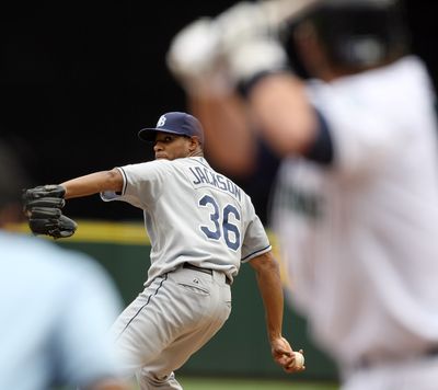 Tampa Bay’s Edwin Jackson pitches to Seattle outfielder Jeremy Reed in the first inning. (Associated Press / The Spokesman-Review)