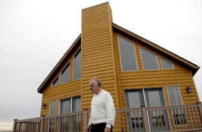 
Vice president and general manager John M. Davis of Stratford Homes in Rathdrum gives a tour of one of the houses. 
 (Kathy Plonka / The Spokesman-Review)