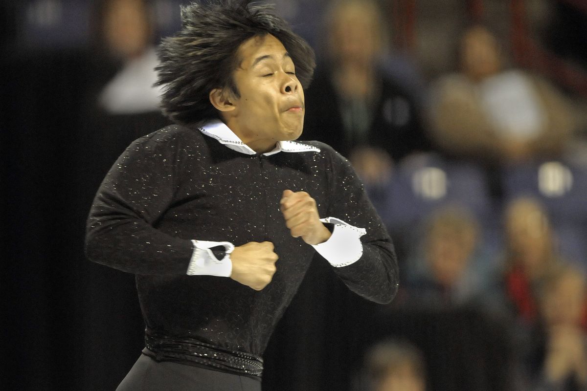 The effort of a spinning jump shows on the face of Christopher Caluza as he competes in the Junior Mens Short Program at the 2010 U.S. Figure Skating Championships in the Spokane Veterans Arena on Friday, January 15, 2010. (Christopher Anderson / The Spokesman-Review)