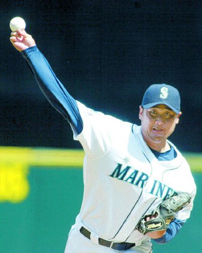 
Seattle's Cha Seung Baek didn't allow a hit until the sixth inning.
 (Associated Press / The Spokesman-Review)