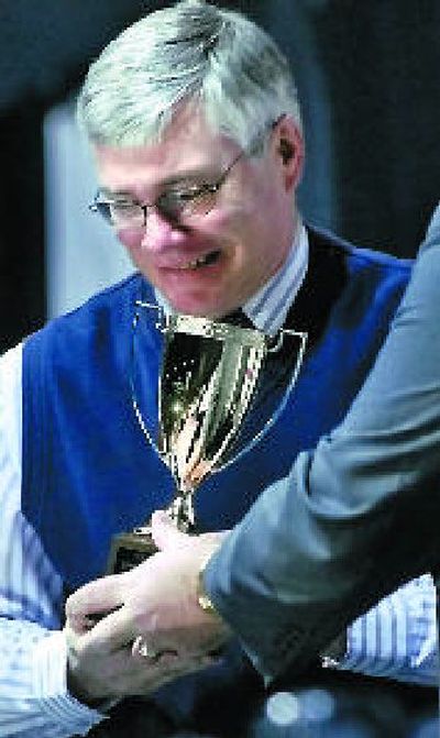 
It was a big year for Lake City and its football coach, Van Troxel, here accepting an award at the Inland Northwest Sports Awards Luncheon in February. 
 (File / The Spokesman-Review)