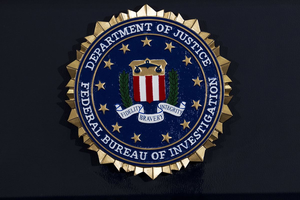 FILE - This Thursday, June 14, 2018, file photo, shows the FBI seal at a news conference at FBI headquarters in Washington. The FBI has been shaken by a series of sexual misconduct cases involving senior leadership over the past few years, including two new claims brought in December 2020 by women who say they were sexually assaulted by supervisors.  (Jose Luis Magana)