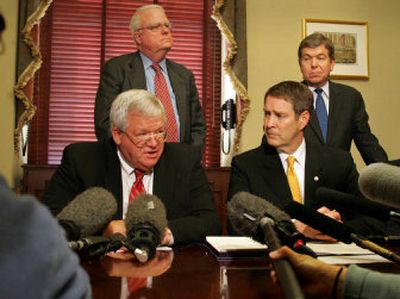 
Speaker of the House Dennis Hastert, left, with Senate Leader Bill Frist, also seated,  Rep. Roy Blunt, R-Mo., and Rep. James Sensenbrenner, R-Wis., responds to a question Friday regarding the resignation of Rep. Mark Foley, R-Fla. 
 (Associated Press / The Spokesman-Review)
