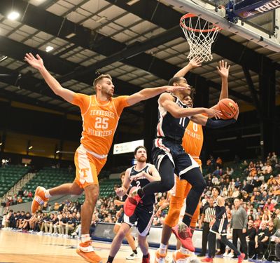 Gonzaga's Rasir Bolton drives past Tennessee's Santiago Vescovi (25) at the Legend of Basketball charity game at the Comerica Center in Frisco Texas Friday, Oct. 28, 2022. (Jesse Tinsley/THE SPOKESMAN-REVIEW)
