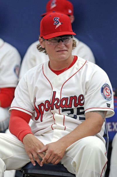 Spokane Indians reliever Matt West (35) waits for the opening pitch with the rest of the bullpen before the game against Vancouver at Avista Stadium on Monday. West was suspended for six games for his role in the bench-clearing brawl with Vancouver on Monday. (Christopher Anderson)