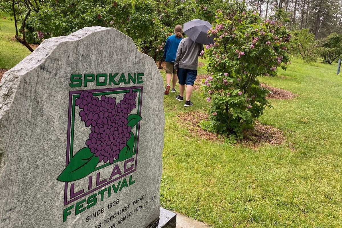 The stone monument commemorating the Spokane Lilac Festival is shown in Manito Park.  (Courtesy)