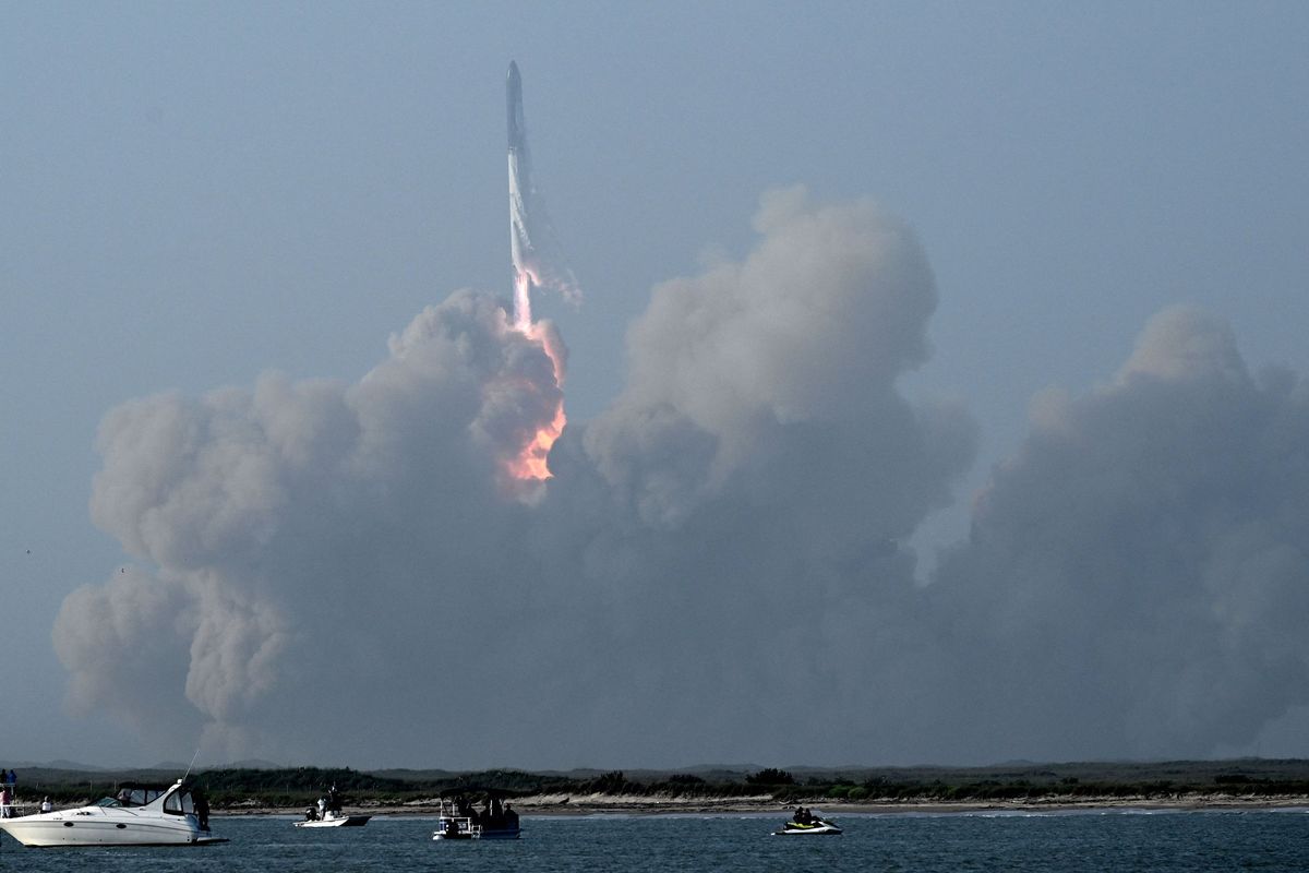 The SpaceX Starship lifts off from the launchpad during a flight test from Starbase in Boca Chica, Texas, on April 20, 2023. The rocket successfully blasted off at 8:33 am Central Time (1333 GMT). The Starship capsule had been scheduled to separate from the first-stage rocket booster three minutes into the flight but separation failed to occur and the rocket blew up.   (Patrick T. Fallon/AFP/Getty Images/TNS)