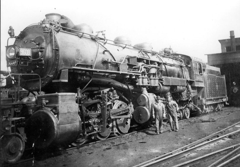 The Chicago, Milwaukee, St. Paul and Pacific freight steam locomotive was built in 1912 and scrapped in 1934. The locomotive was used to pull freight trains on the Milwaukee main line from Avery, Idaho to Othello, Wash. David L. Snyder, left, worked for the Milwaukee from 1920 to 1928. He later worked as an engineer for the Great Northern Railway in Spokane.  Photo submitted by David L. Snyder, son