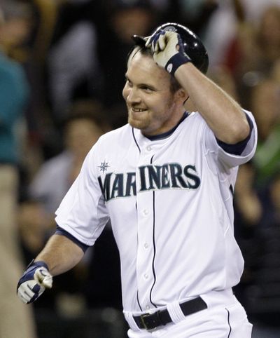 Mariners’ Ryan Langerhans is all smiles after his walk-off homer.  (Associated Press / The Spokesman-Review)