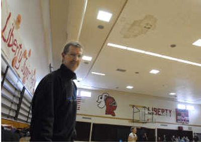 
Liberty School District Superintendent Bill Motsenbocker stands in the gymnasium of the Liberty Elementary/Junior High School, which has a leaking ceiling. 
 (J. Bart Rayniak / The Spokesman-Review)