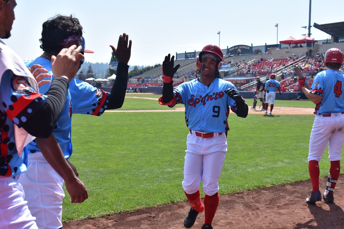 Spokane Indians outfielder GJ Hill is greeted by teammates after his second homer of the day against the Hillsboro Hops on Aug. 4, 2024 at Avista Stadium.  (Spokane Indians)