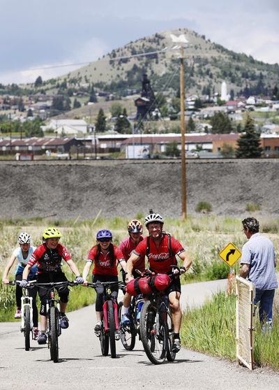 John “Bear” Stillwagon rides through Butte with local bicyclists including members of the Copper Sprockets youth bike racing team on June 18, 2019, just a few days after leaving the Tour Divide start point in Alberta, Canada. Stillwagon was in the top 10 riders at the time and crossed the finish line in New Mexico with a tie for 9th place. The race is a 2,745-mile mountain biking trek from Canada to the Mexico border. (Meagan Thompson / Montana Standard)