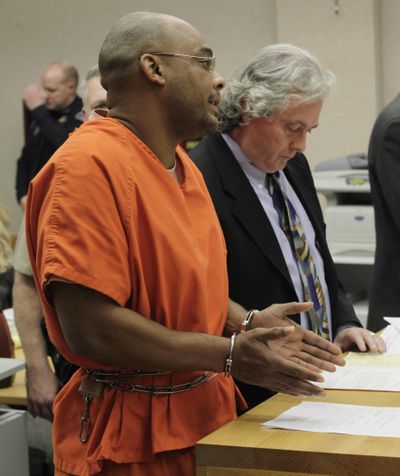 Darcus Allen appears in Pierce County Superior Court on Wednesday in Tacoma. Allen is accused of driving suspected gunman Maurice Clemmons away from the coffee shop where four officers were killed Sunday. Public defender Jack McNeish is at right. Associated Press photos (Associated Press photos)
