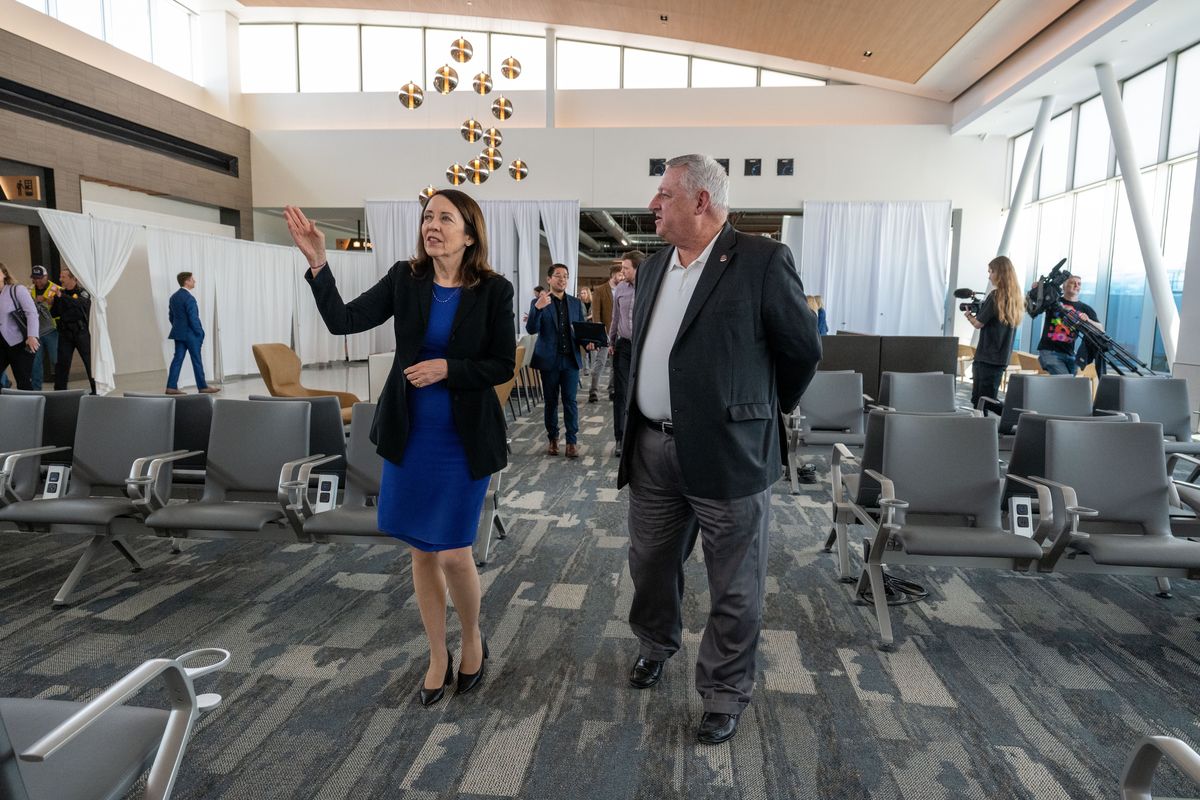 U.S. Sen. Maria Cantwell and Spokane County Commissioner Al French tour the new Spokane International Airport C West Terminal during a grand opening reveal in May 2024. The expansion improves capacity at the airport, allowing for more flights, gates and ticket counters, and is part of a larger construction project that will get back underway this summer.  (COLIN MULVANY/THE SPOKESMAN-REVIEW)