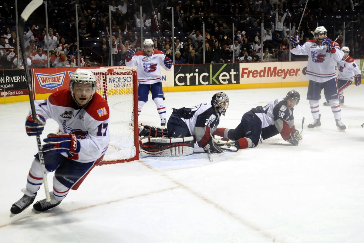 Spokane's Mitch Holmberg reacts to the crowd while his teammates  celebrate his second first-period goal to put the Chiefs ahead 2-1 over the Tri-City Americans. J. (J. Rayniak / The Spokesman-Review)