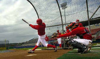 
Casey Benjamin, taking a few cuts in the batting cage on Friday, is back with the Indians.
 (Christopher Anderson / The Spokesman-Review)