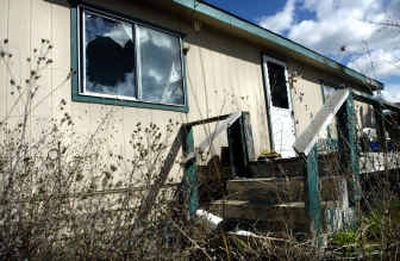 
An abandoned manufactured home at 19705 E. Maxwell Ave. has residents of the Mission Villa manufactured home park upset about the stench and potential health threat.
 (Holly Pickett / The Spokesman-Review)
