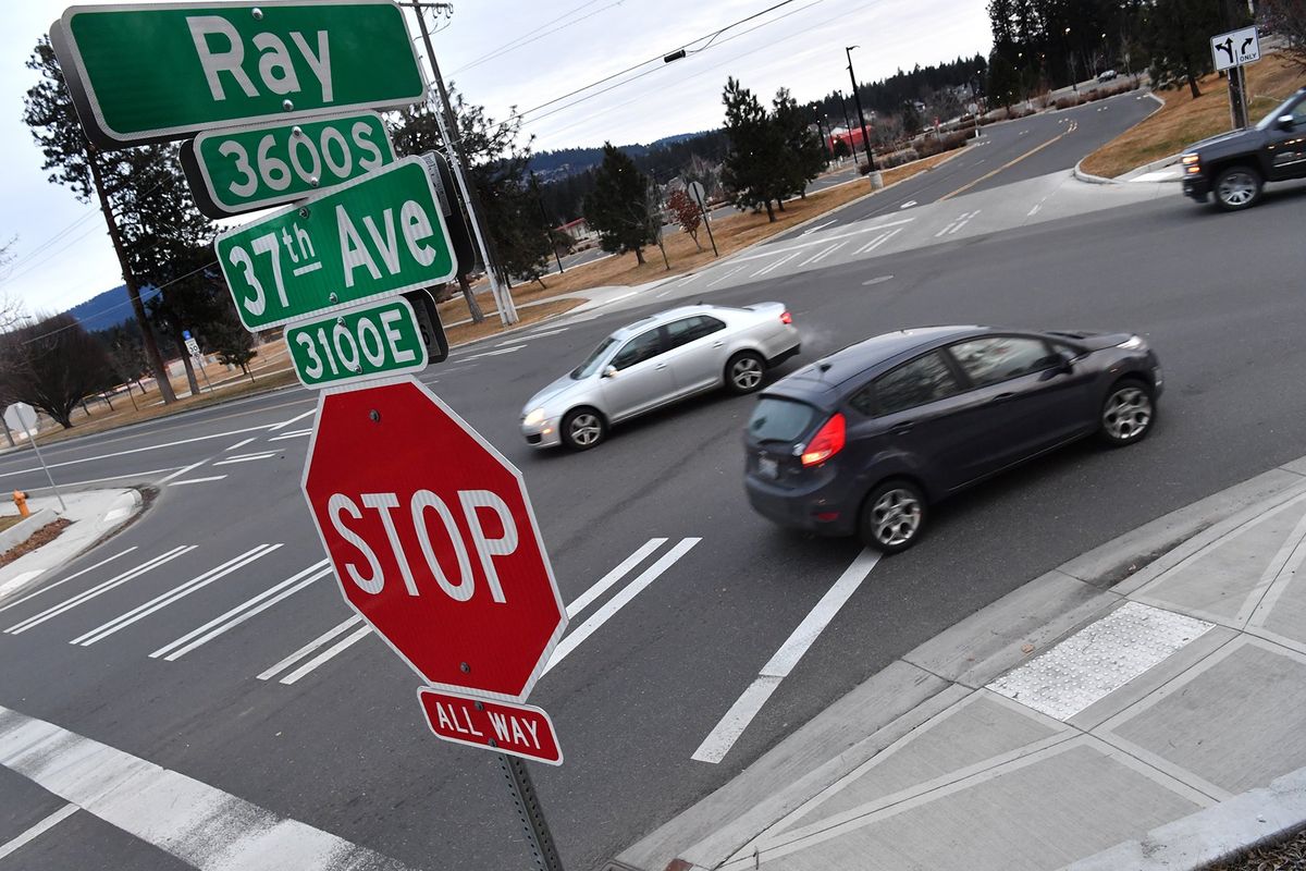 Cars navigate through the intersection of Ray Street and 37th Avenue on Spokane’s South Hill in February, 2021.  (Tyler Tjomsland/THE SPOKESMAN-REVIEW)