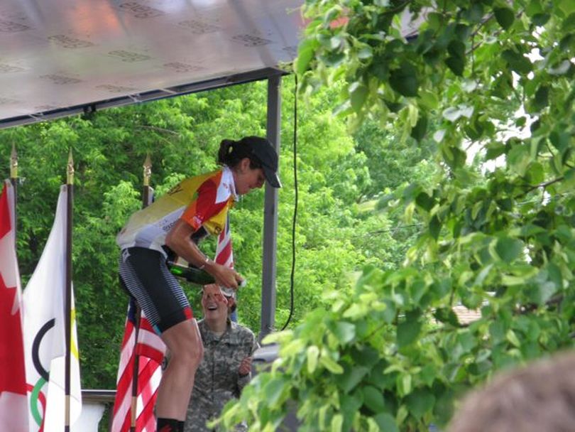 Evelyn Stevens sprays a bottle of champagne at the awards ceremony after winning the Exergy Tour. (Betsy Russell)