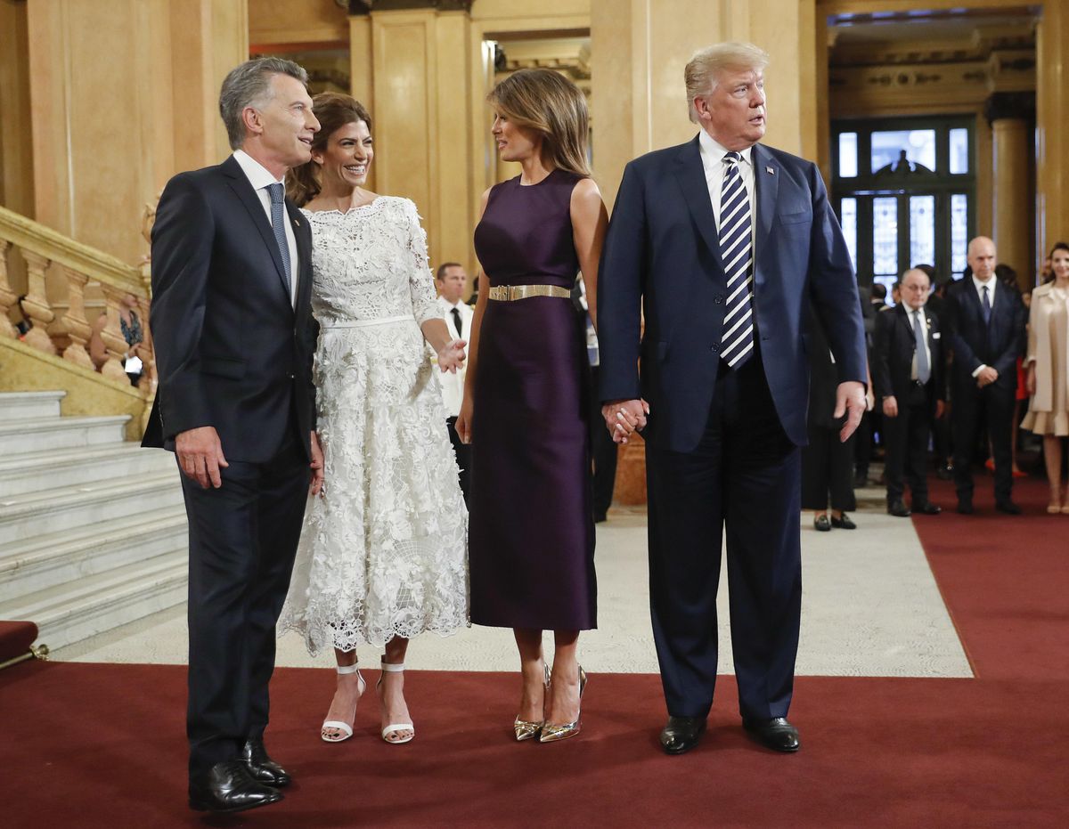 President Donald Trump and first lady Melania Trump talk with Argentina’s President Mauricio Macri and his wife Juliana Awada as they arrive at the Teatro Colon to join other heads of state for the G20 leaders dinner, on Friday, Nov. 30, 2018 in Buenos Aires, Argentina. (Pablo Martinez Monsivais / AP)