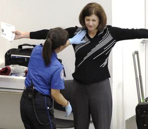 For illustrative purposes only: A woman undergoes a pat-down during TSA security screening at Seattle-Tacoma International Airport in Seattle. (AP File Photo/Ted S. Warren)